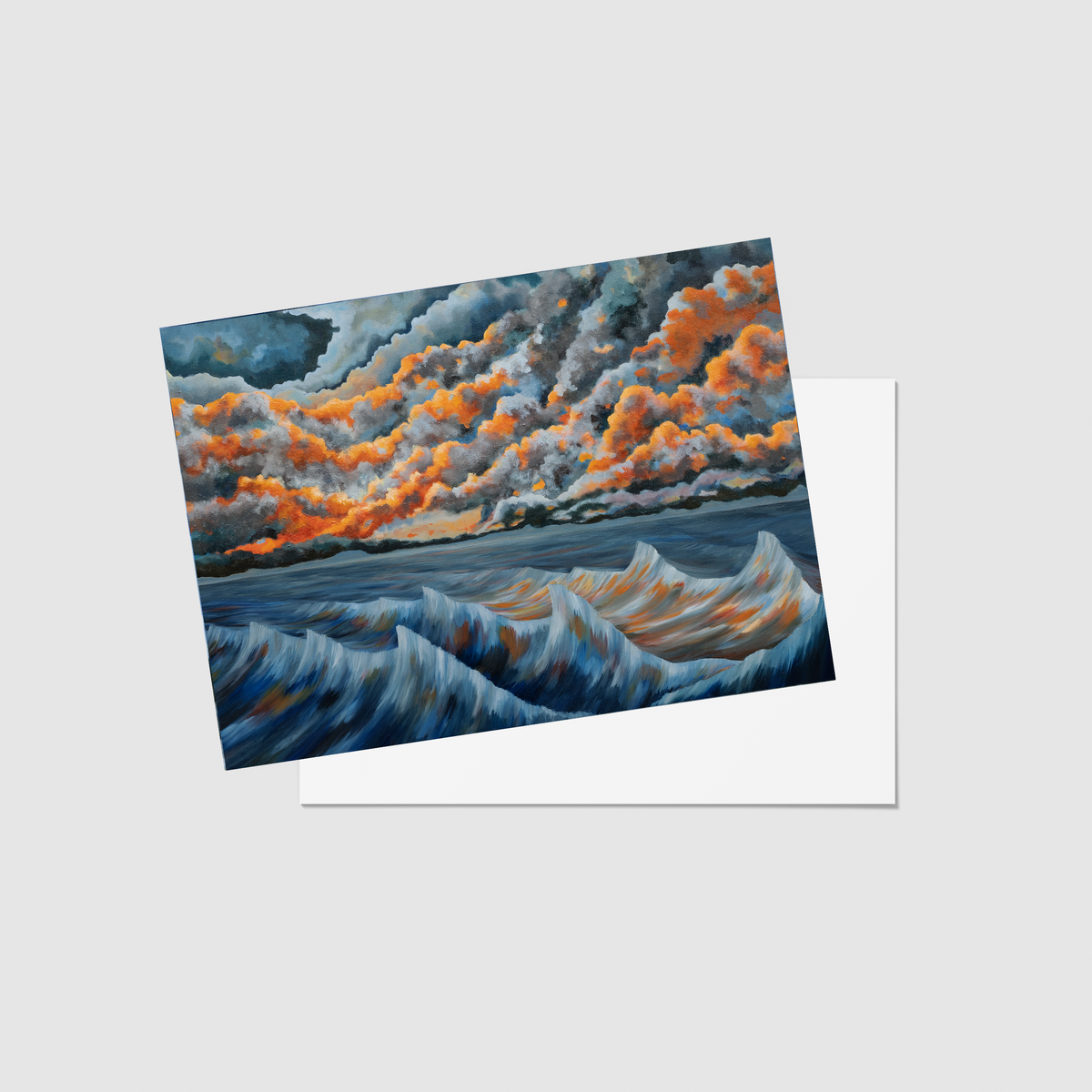 A square art print or card featuring an expressive seascape painting with dark blue waves and dramatic orange, gray, and white clouds, shown against a light gray background with a white envelope behind it.